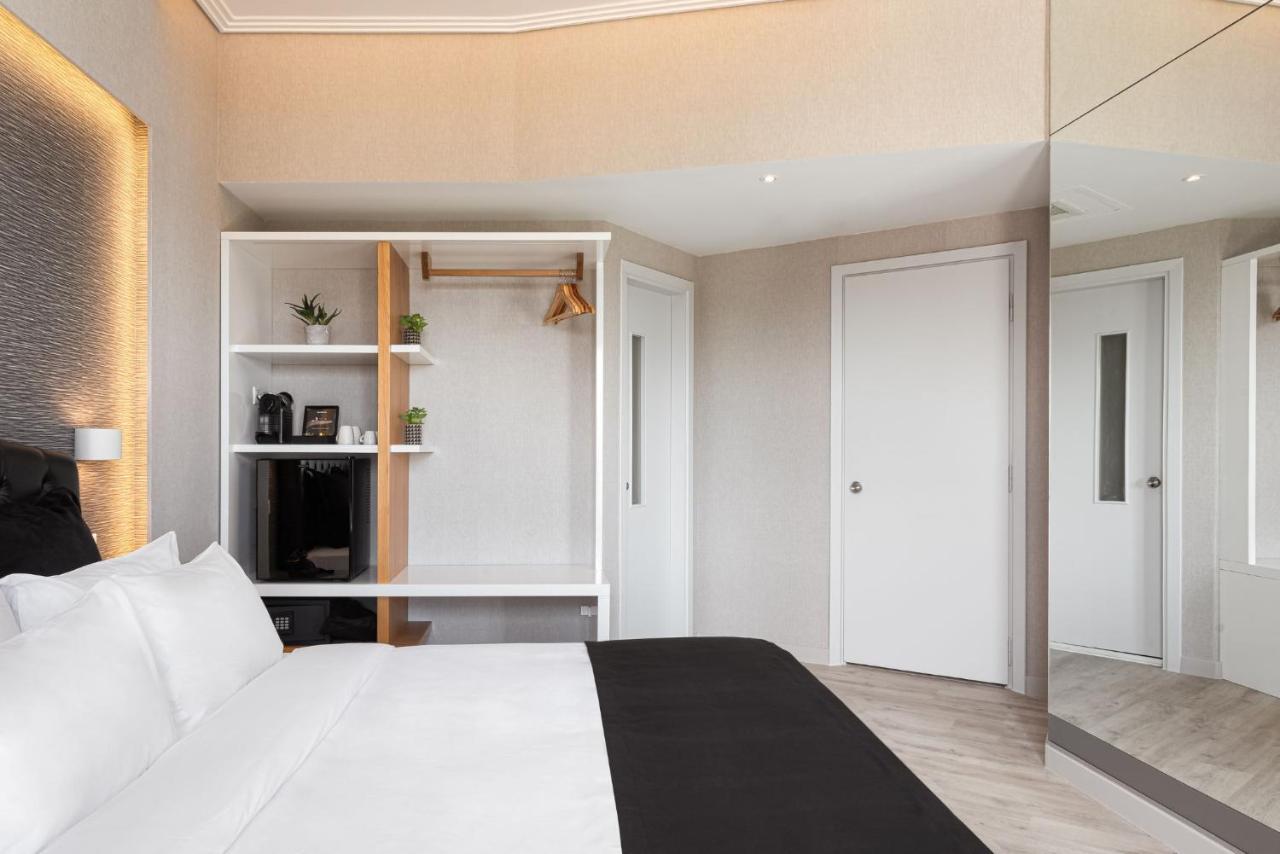 Kreoli Suites Glyfada Atene Esterno foto