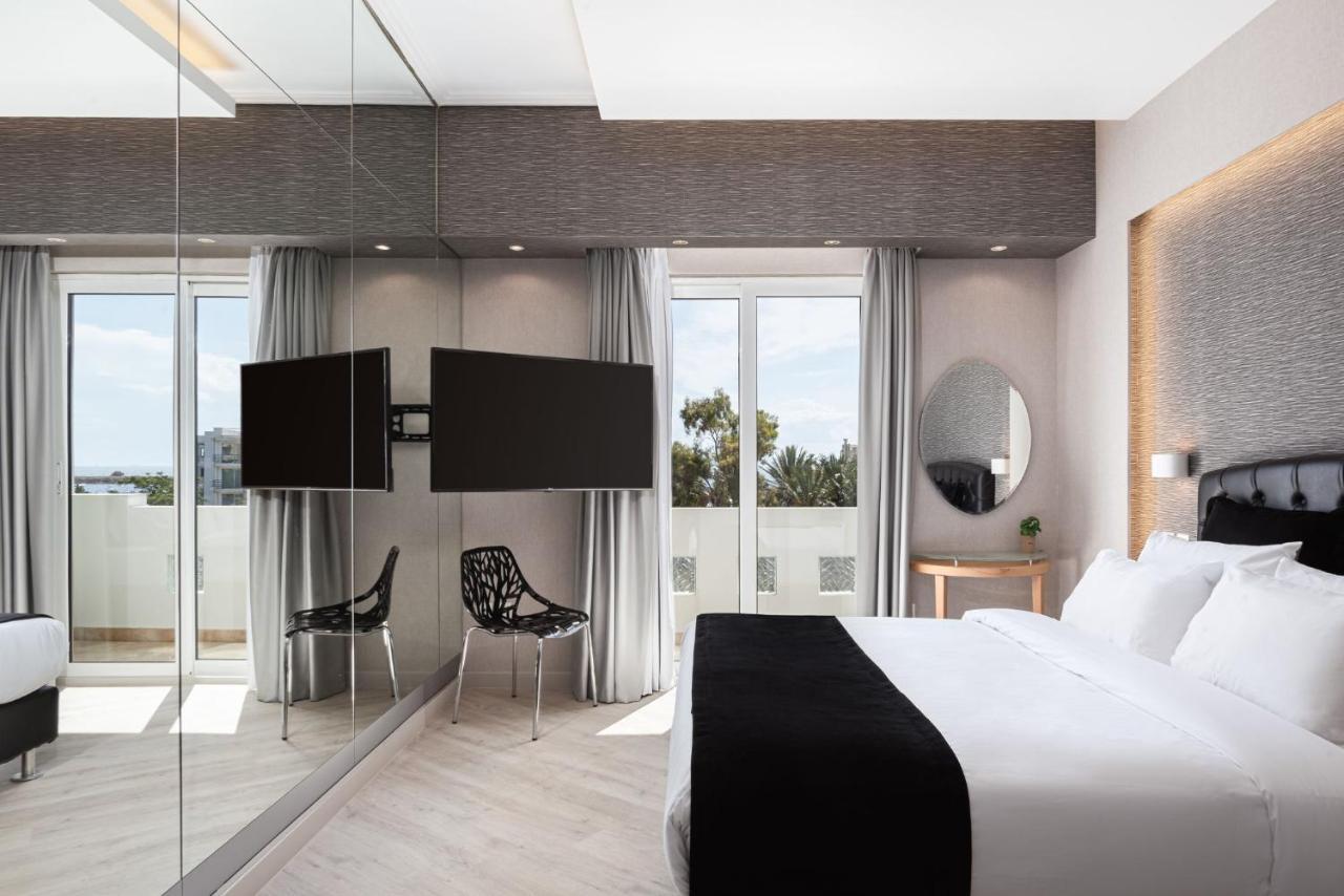 Kreoli Suites Glyfada Atene Esterno foto